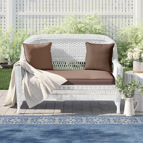 White rattan store loveseat